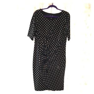 Faux wrap dress, ruching on side at the waist.